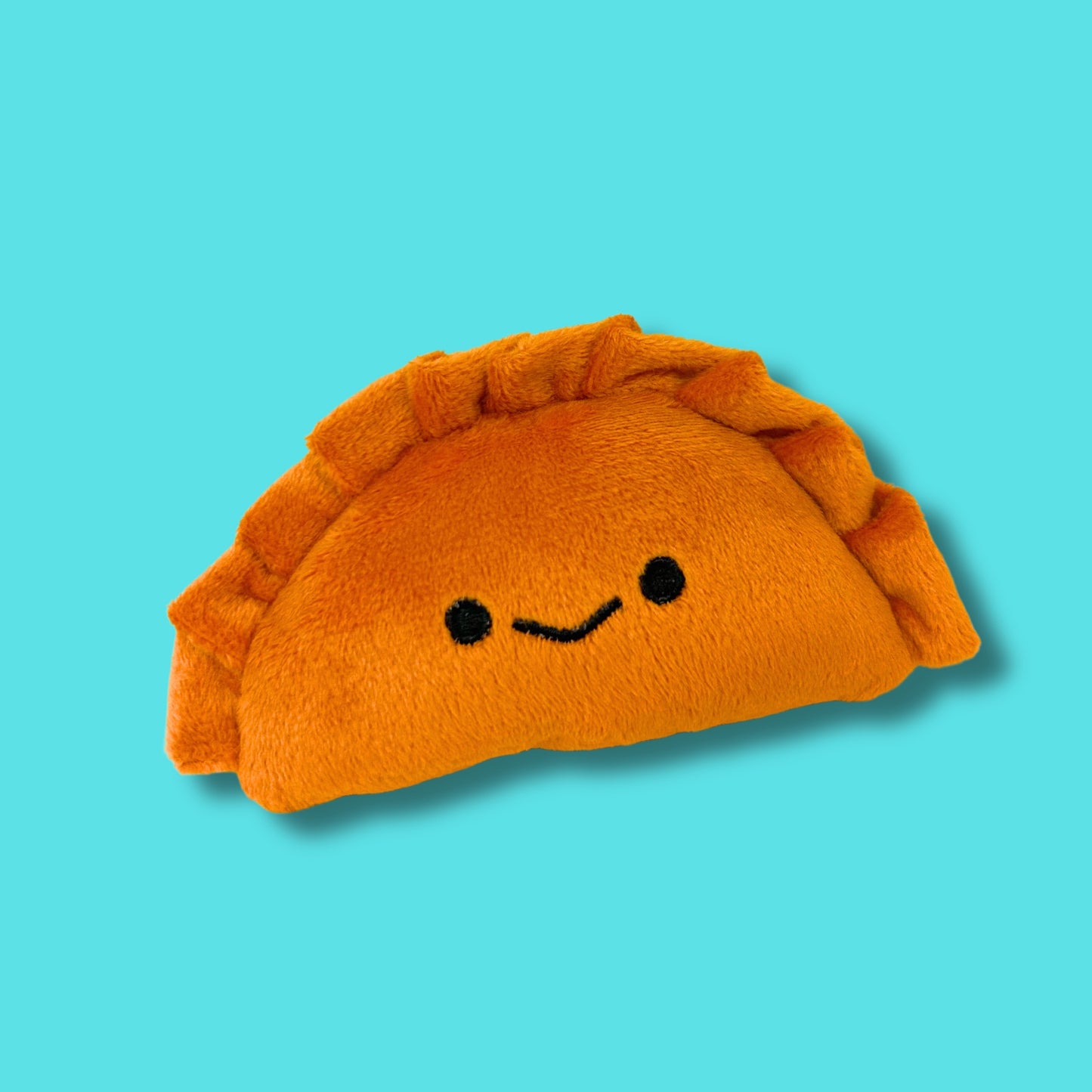 Empanada Rattle